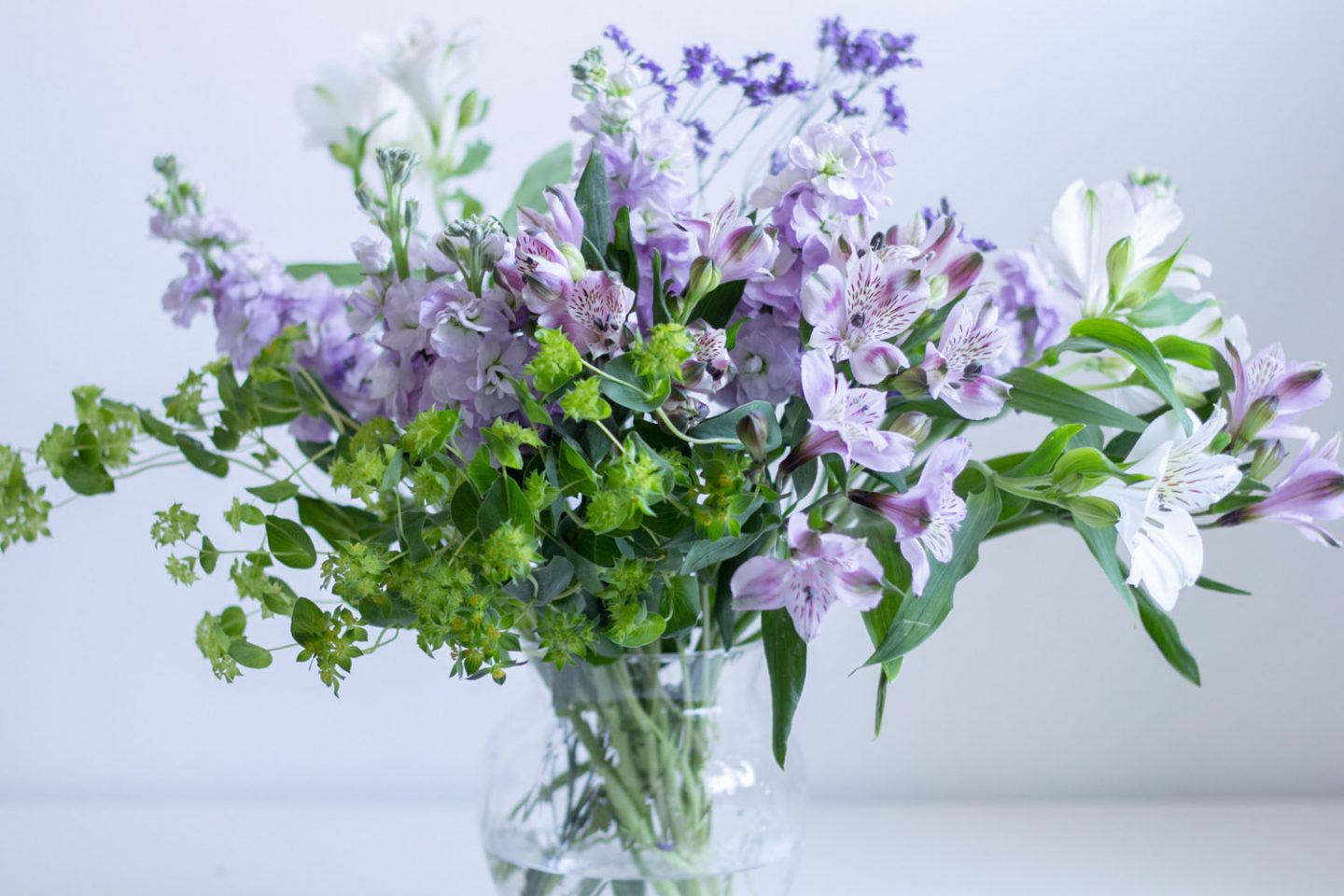 Purple White Green Flowers in Vase